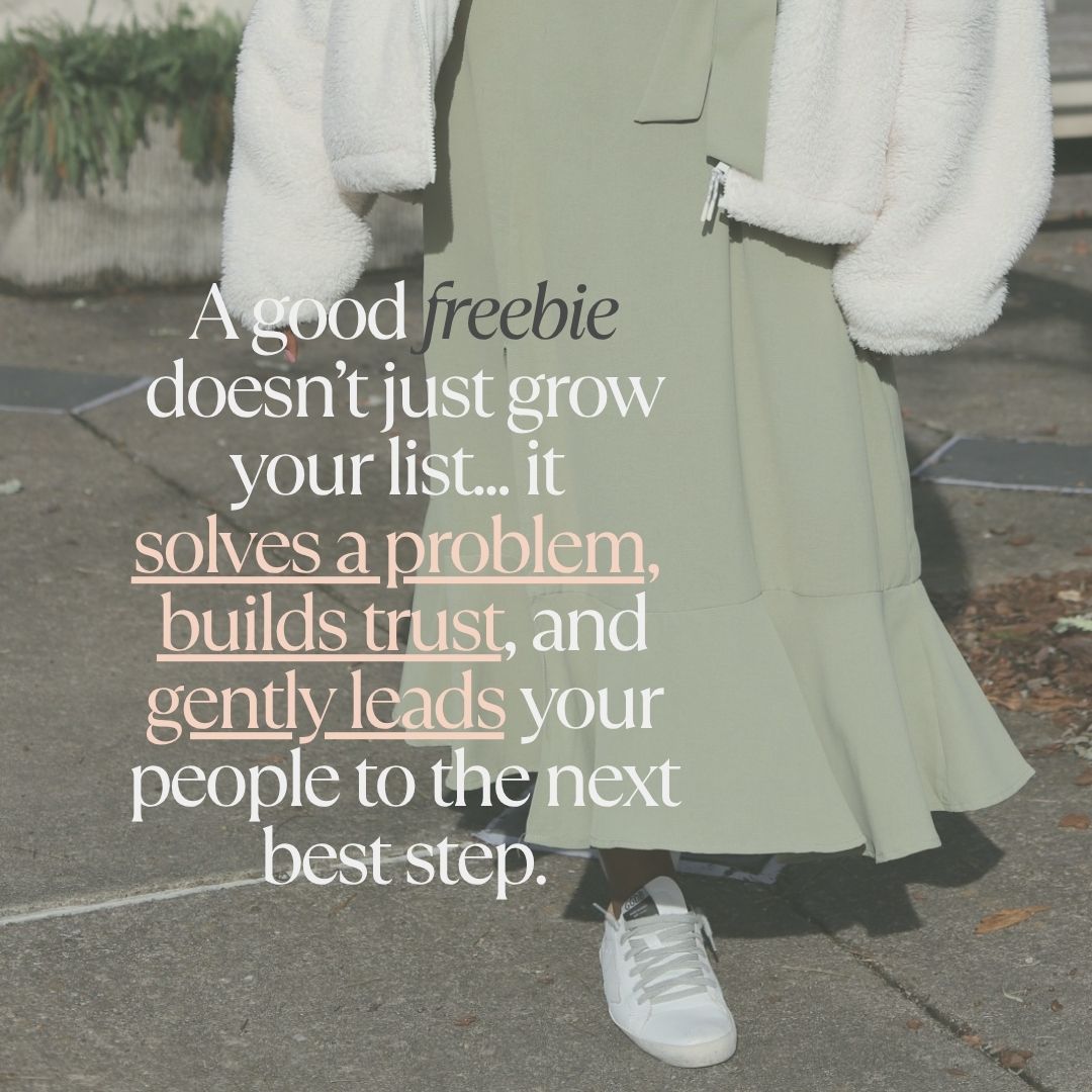 walking in green dress and white shoes and white jacket for blog freebie ideas for small business owners